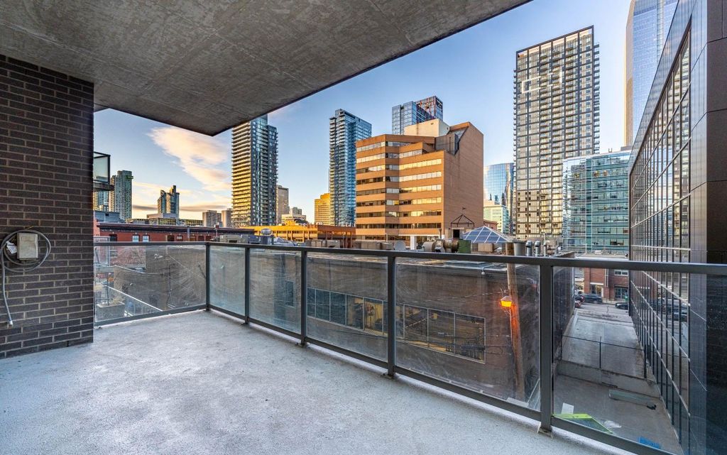 Photo of 530 12 Avenue SW #303, Calgary, AB T2R 0B1 (MLS # A2287840)