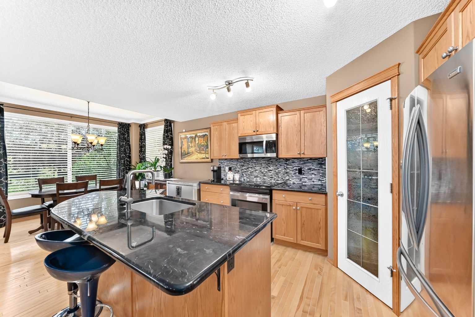 144 Cougarstone Common SW