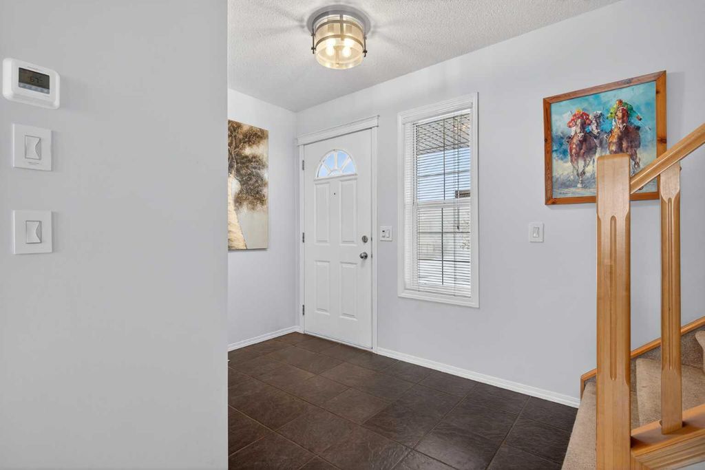 Photo of 6 Royal Birch Rise NW, Calgary, AB T3G 5K2 (MLS # A2299513)