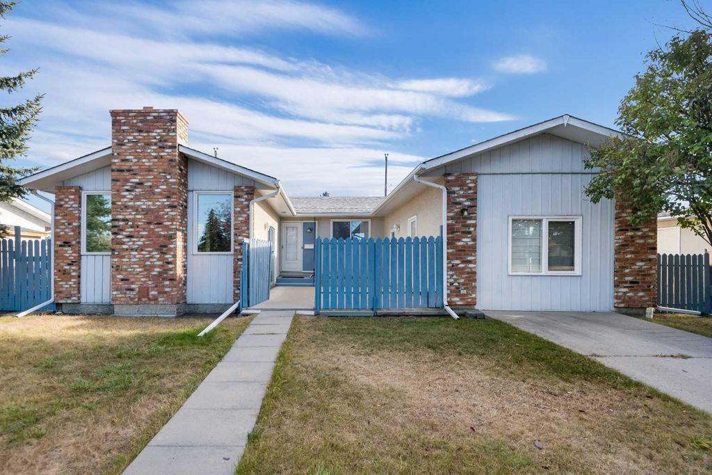 Photo of 228 Queensland Drive SE, Calgary, AB T2J 3R8 (MLS # A2266895)