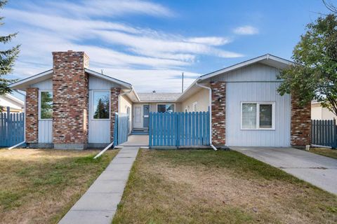 Photo of 228 Queensland Drive SE, Calgary, AB T2J 3R8 (MLS # A2266895) Photo of 228 Queensland Drive SE, Calgary, AB T2J 3R8 (MLS # A2266895)