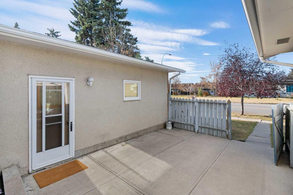 Photo of 228 Queensland Drive SE, Calgary, AB T2J 3R8 (MLS # A2266895)