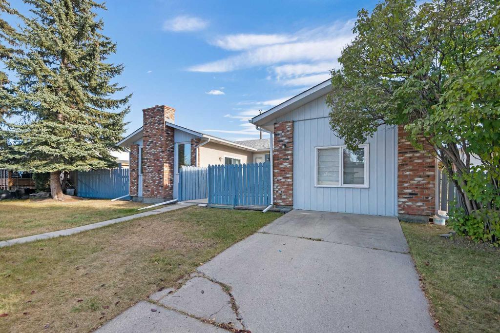 Photo of 228 Queensland Drive SE, Calgary, AB T2J 3R8 (MLS # A2266895)