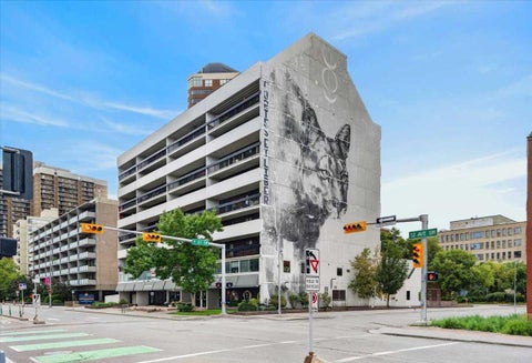 Photo of 735 12 Avenue SW #402, Calgary, AB T2R 1J7 (MLS # A2345184)