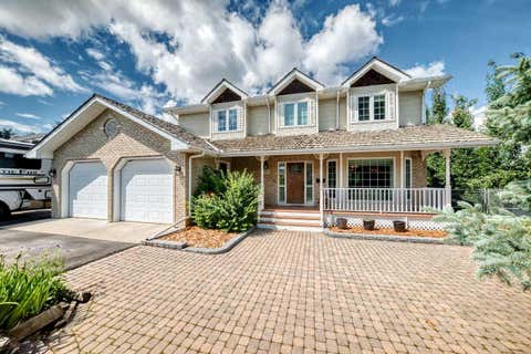 Photo of 777 EAST LAKEVIEW Road, Chestermere, AB T1X 1B1 (MLS # A2330494)