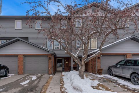 64 Woodacres Crescent SW 16 Calgary AB T2W 4V6