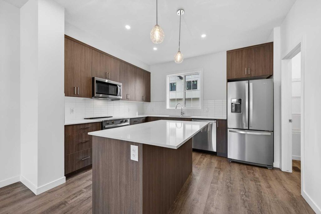 Photo of 64 Creekside Drive SW, Calgary, AB T2X 6E2 (MLS # A2282898)