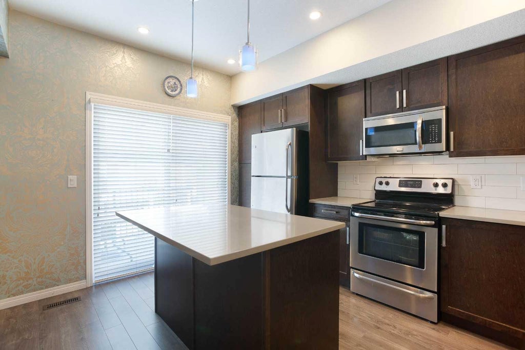 Photo of 280 Williamstown Close NW #1003, Airdrie, AB T4B 4B6 (MLS # A2350206)