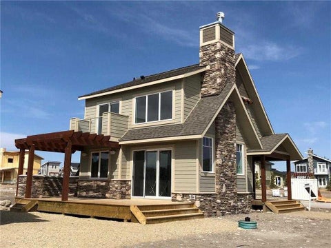 Photo of 301 Cottageclub Green, Rural Rocky View County, AB T4C 1B1 (MLS # A2320466)