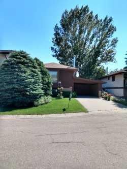 Photo of 100 Doverglen Crescent SE, Calgary, AB T2B 2P6 (MLS # A2350083)