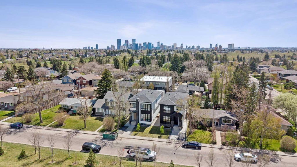 Photo of 1025 32 Avenue NW, Calgary, AB T2K 0B2 (MLS # A2342463)