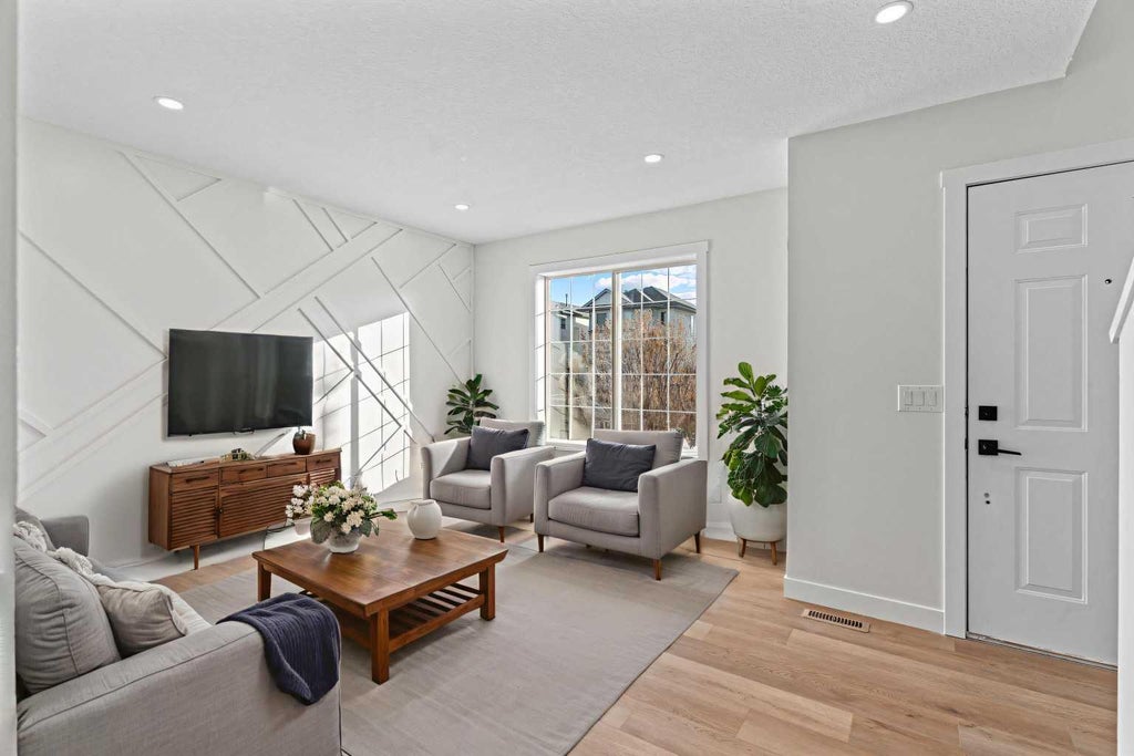 Photo of 52 Martin Crossing Rise NE, Calgary, AB T3J 3P1 (MLS # A2345526)