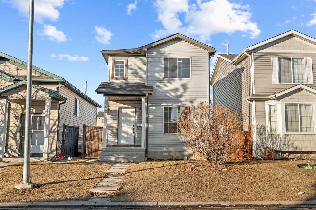 Photo of 52 Martin Crossing Rise NE, Calgary, AB T3J 3P1 (MLS # A2345526)