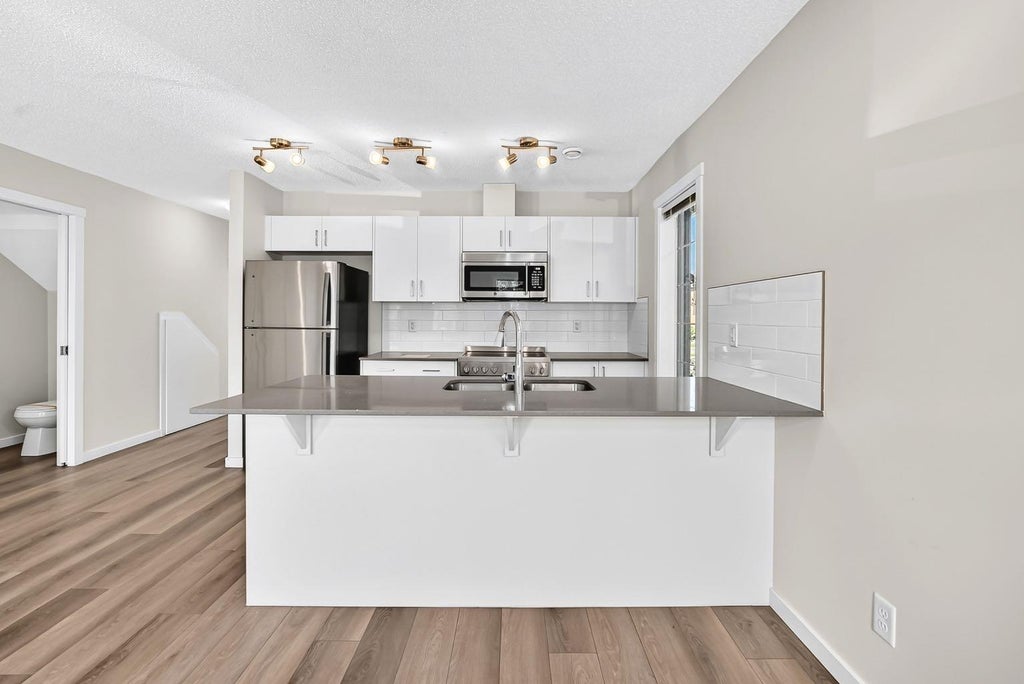Photo of 428 Cranbrook Square SE, Calgary, AB T3M 3K9 (MLS # A2337313)