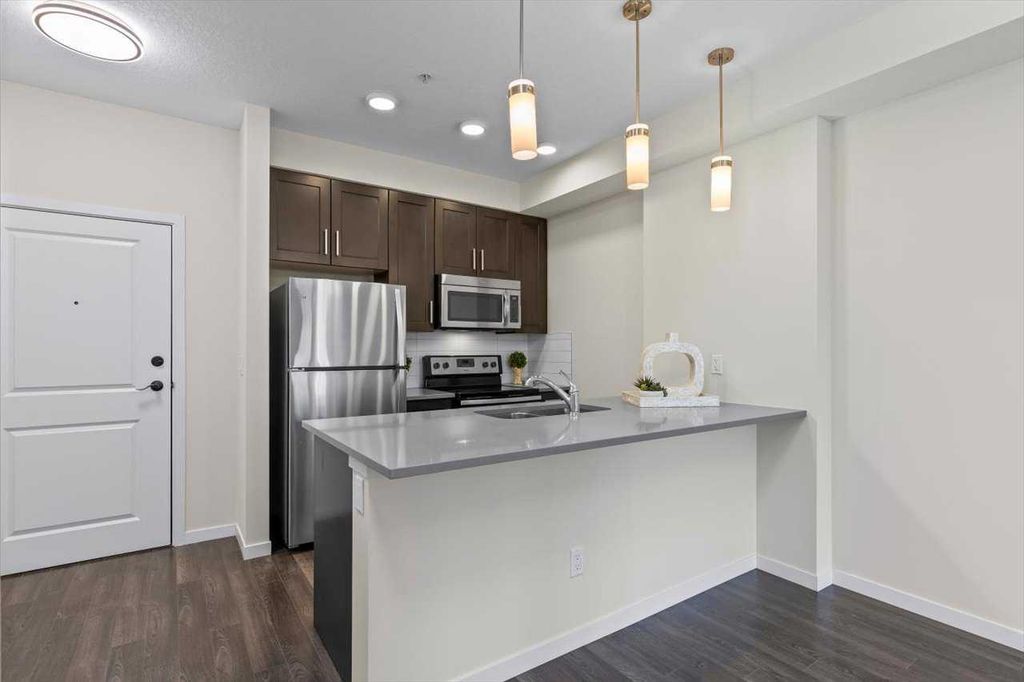 Photo of 10 Mahogany Mews SE #218, Calgary, AB T3M 2R1 (MLS # A2283432)