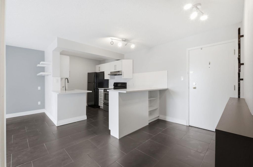 Photo of 1330 15 Avenue SW #505, Calgary, AB T3C 3V3 (MLS # A2288116)
