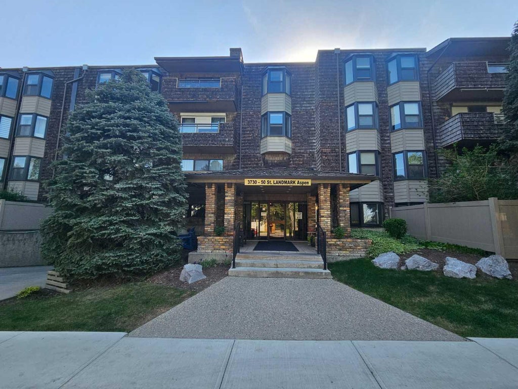 Photo of 3730 50 Street NW #410, Calgary, AB T3A 2V9 (MLS # A2272893)