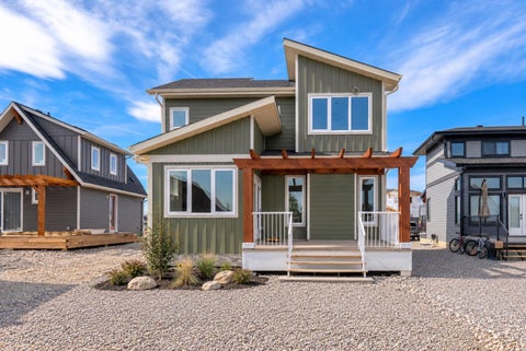 Photo of 638 Cottageclub Bend, Rural Rocky View County, AB T4C 1B1 (MLS # A2342734)