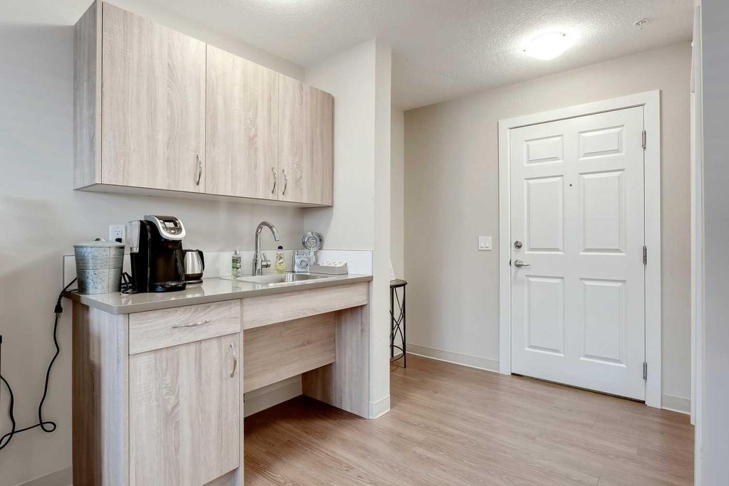 Photo of 2635 Eversyde Avenue SW #404, Calgary, AB T2Y 5G9 (MLS # A2299697)