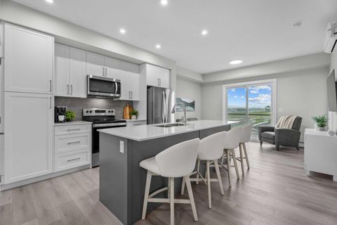 100 Banister Drive 2406 Okotoks AB T1S 5Y3