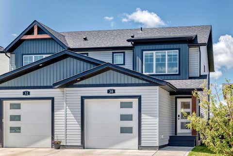 Photo of 30 Iron Gate Boulevard, Sylvan Lake, AB T4S 0T6 (MLS # A2326470)