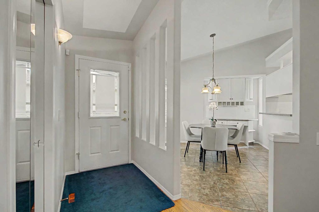 Photo of 26 Mt Mckenzie Villas SE, Calgary, AB T2Z 2P9 (MLS # A2344891)