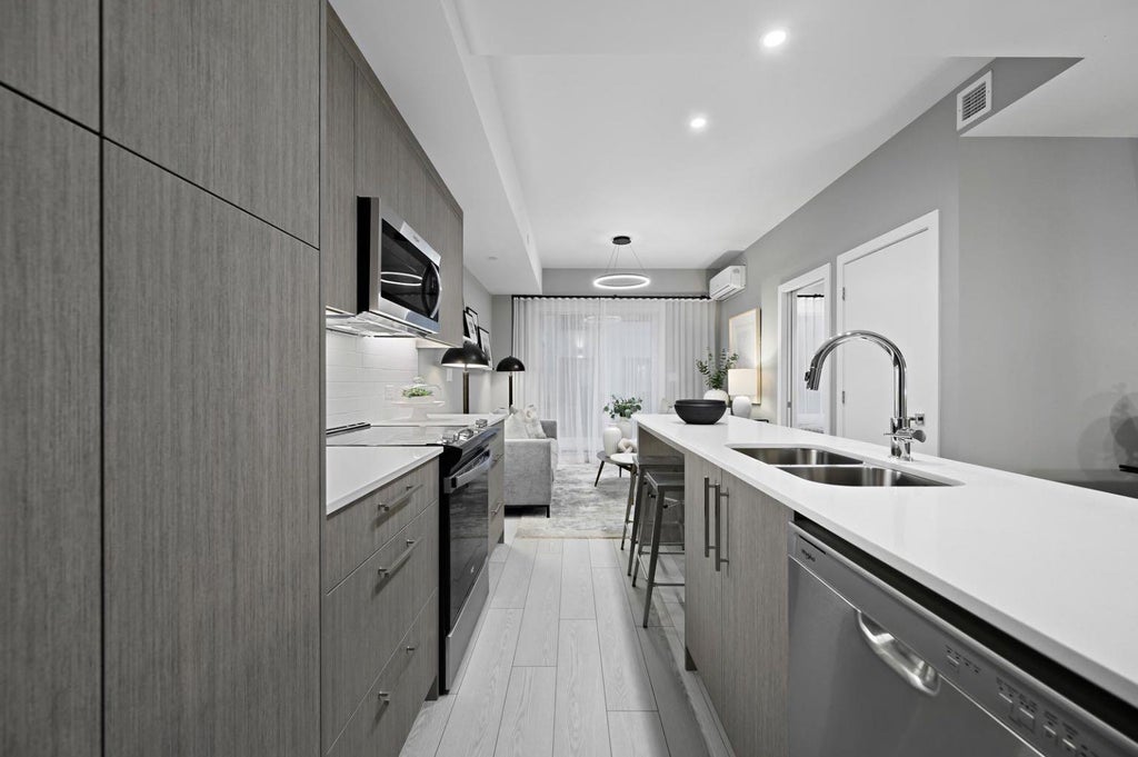 Photo of 310 15 Avenue SW #221, Calgary, AB T2R 1S9 (MLS # A2332097)