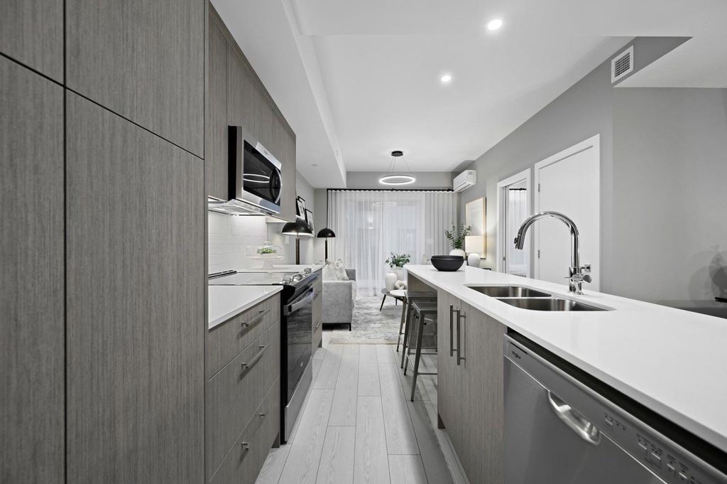 Photo of 310 15 Avenue SW #221, Calgary, AB T2R 1S9 (MLS # A2299227)