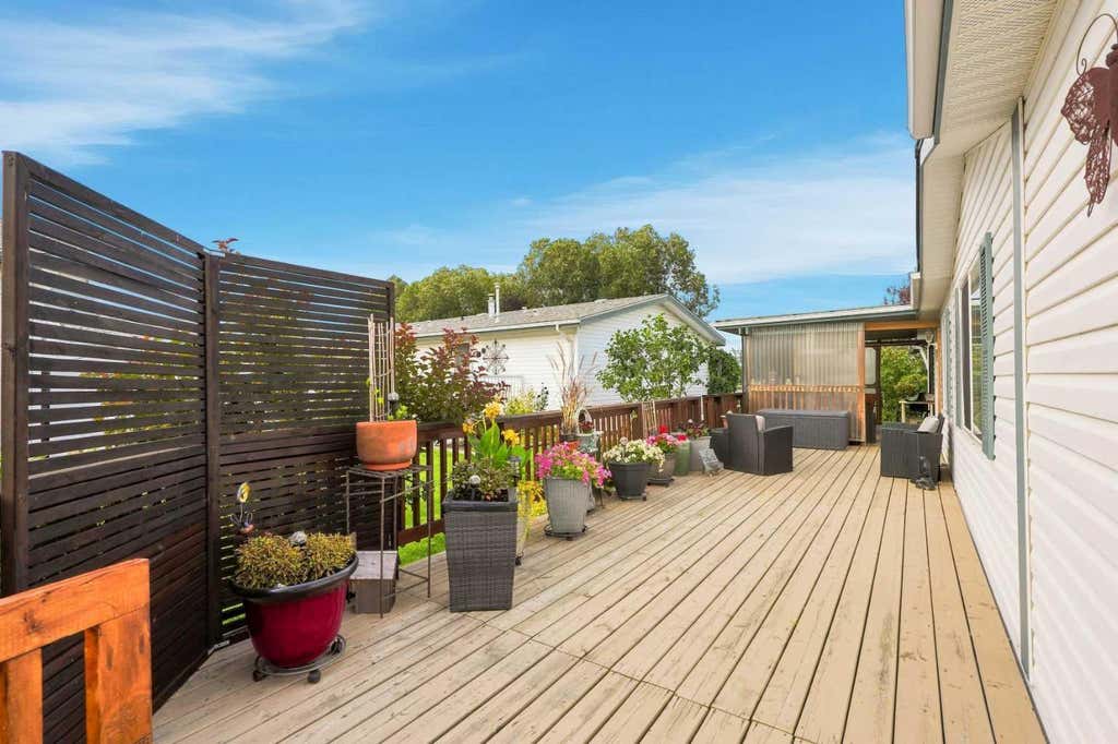 Photo of 225 Ranchwood Lane, Strathmore, AB T1P 1M8 (MLS # A2340171)