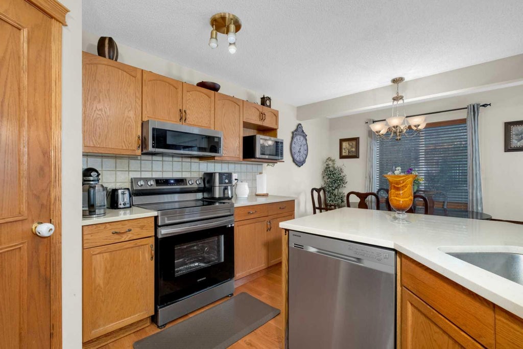 Photo of 373 Bridlewood Avenue SW, Calgary, AB T2Y 4H5 (MLS # A2323923)