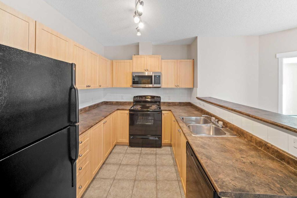 Photo of 333 Taravista Drive NE #1315, Calgary, AB T3J 0H3 (MLS # A2314724)