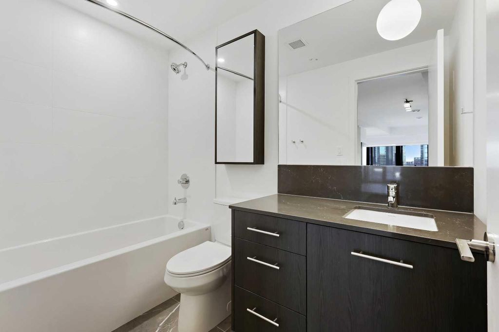 Photo of 730 2 Avenue SW #1103, Calgary, AB T2P 1R8 (MLS # A2270768)