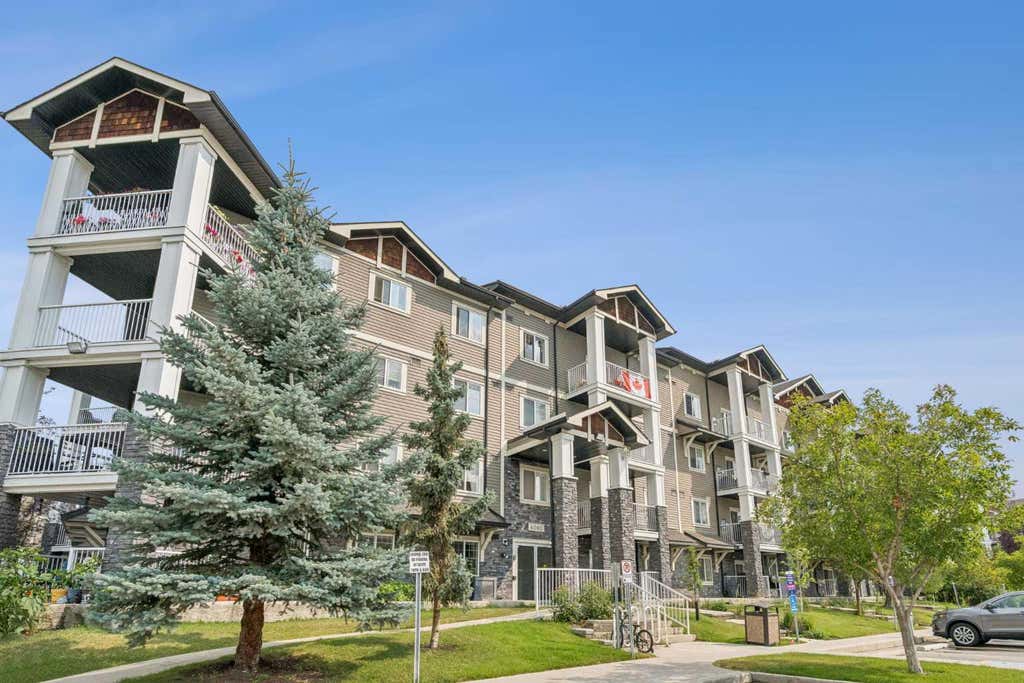 Photo of 115 Prestwick Villas SE #4410, Calgary, AB T2Z 0M8 (MLS # A2335124)