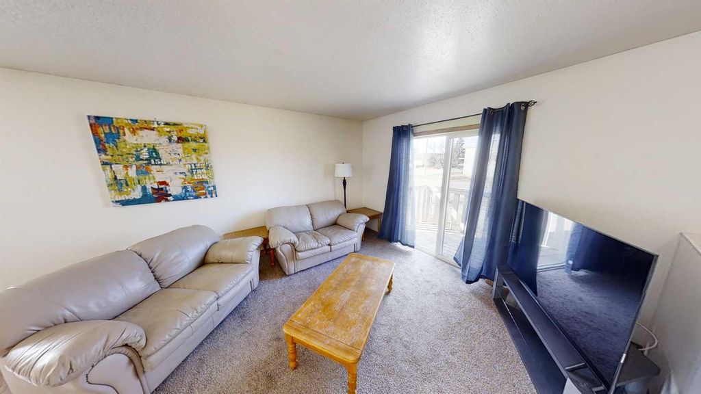 Photo of 10605 102 Street #D, Grande Prairie, AB T8V 2W8 (MLS # A2289200)