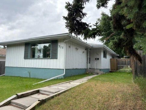 Photo of 715 64 Avenue NW, Calgary, AB T2K 0M3 (MLS # A2332748)
