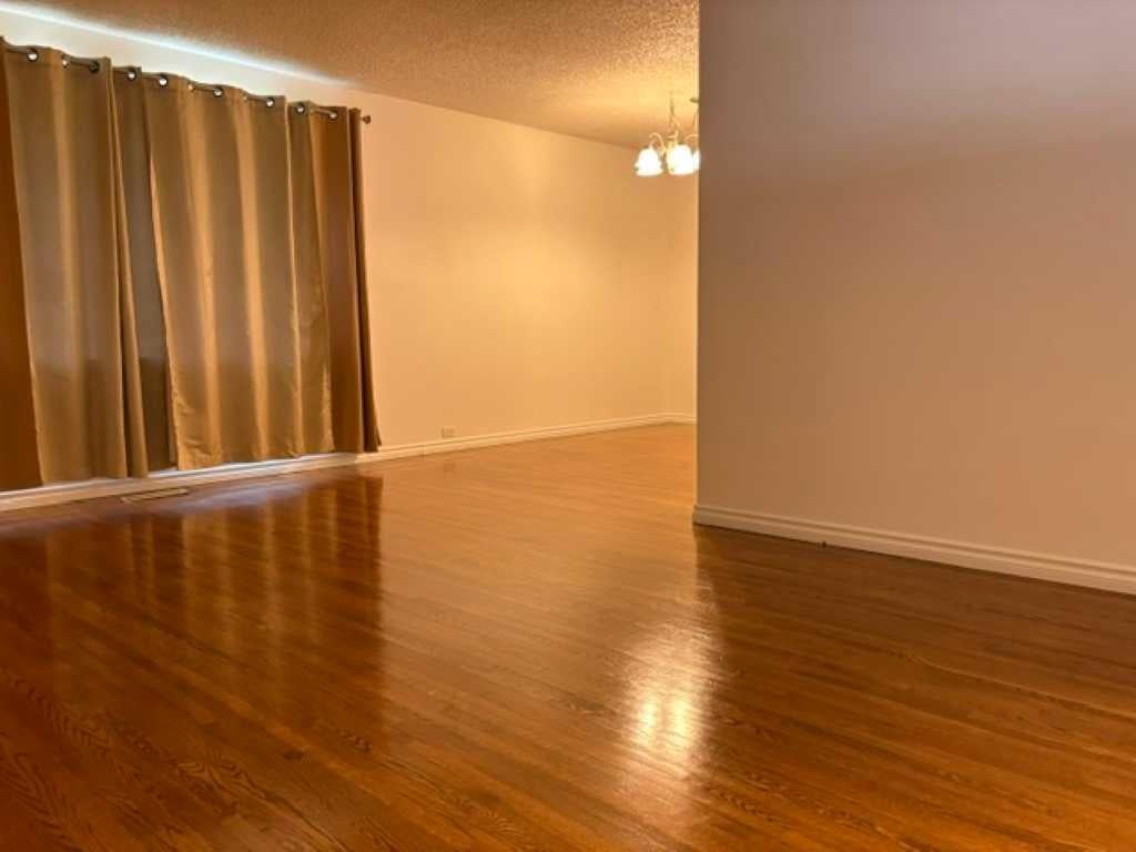 Photo of 715 64 Avenue NW, Calgary, AB T2K 0M3 (MLS # A2332748)