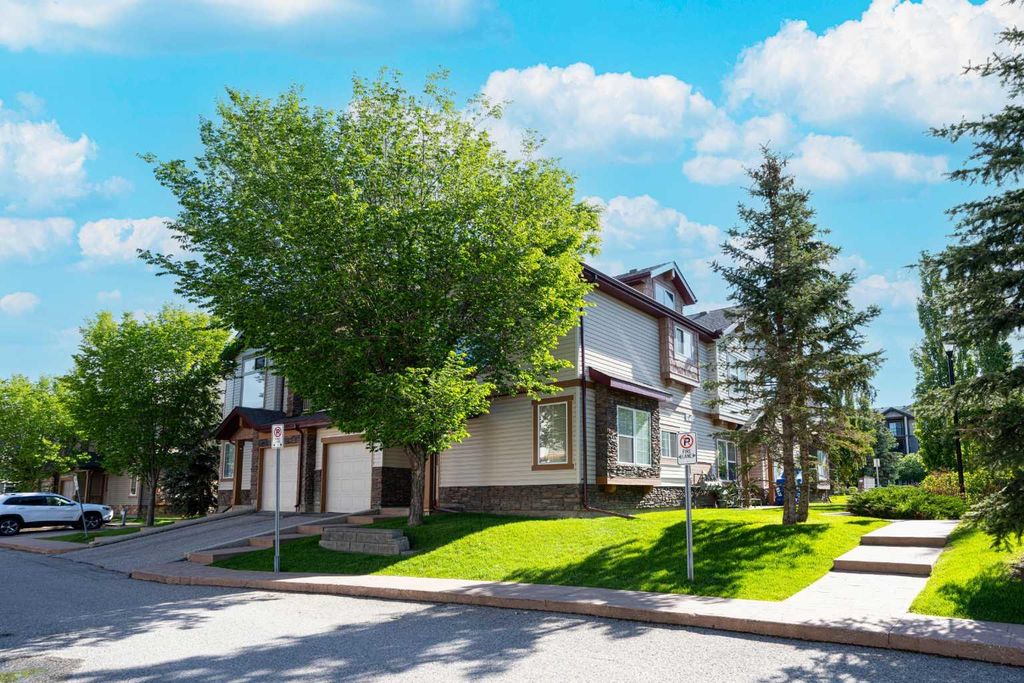 Photo of 11 Panatella Landing NW #203, Calgary, AB T3K 0K8 (MLS # A2319198)