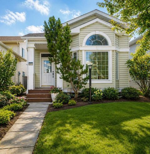 Photo of 6923 Laguna Way NE, Calgary, AB T1Y 6W2 (MLS # A2304304)