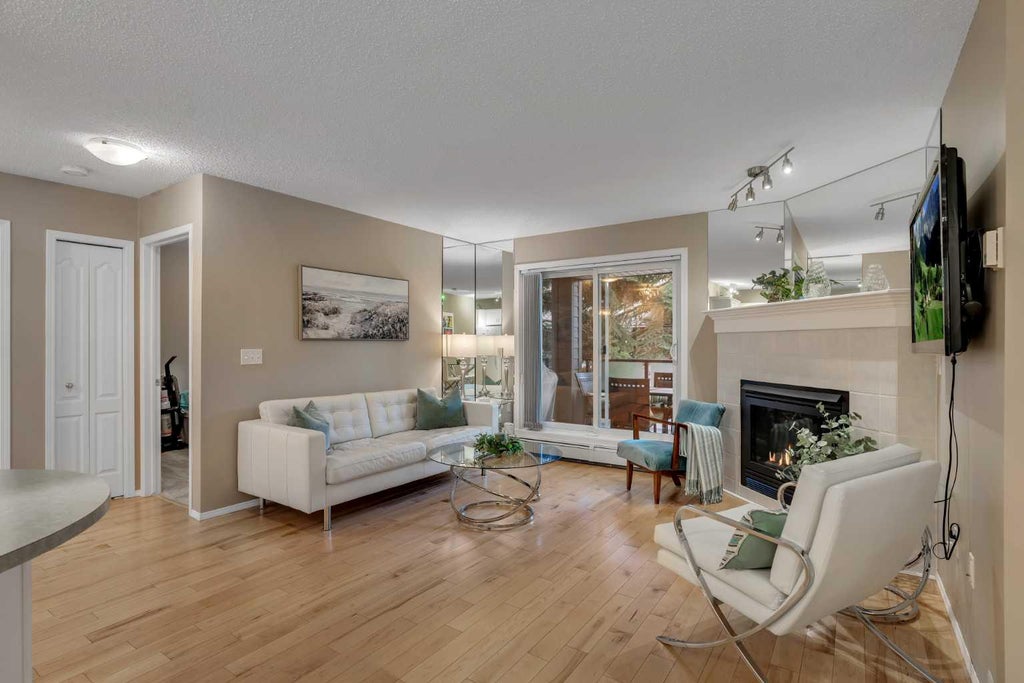 Photo of 10 Sierra Morena Mews SW #215, Calgary, AB T3H 3K5 (MLS # A2350425)