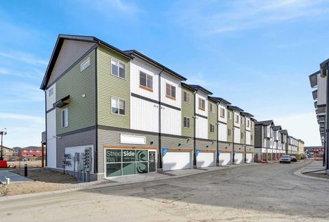 Photo of 28 Red Embers Plaza NE #102, Calgary, AB T3N 2W1 (MLS # A2300553)