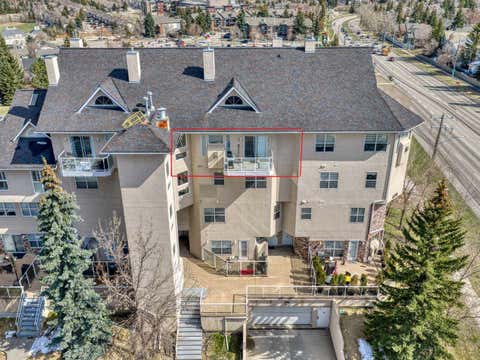 Photo of 6550 Old Banff Coach Road SW #114, Calgary, AB T3H 4J4 (MLS # A2335767)