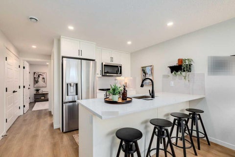 Photo of 40 Livingston Parade NE #113, Calgary, AB T4B 3P6 (MLS # A2342683)