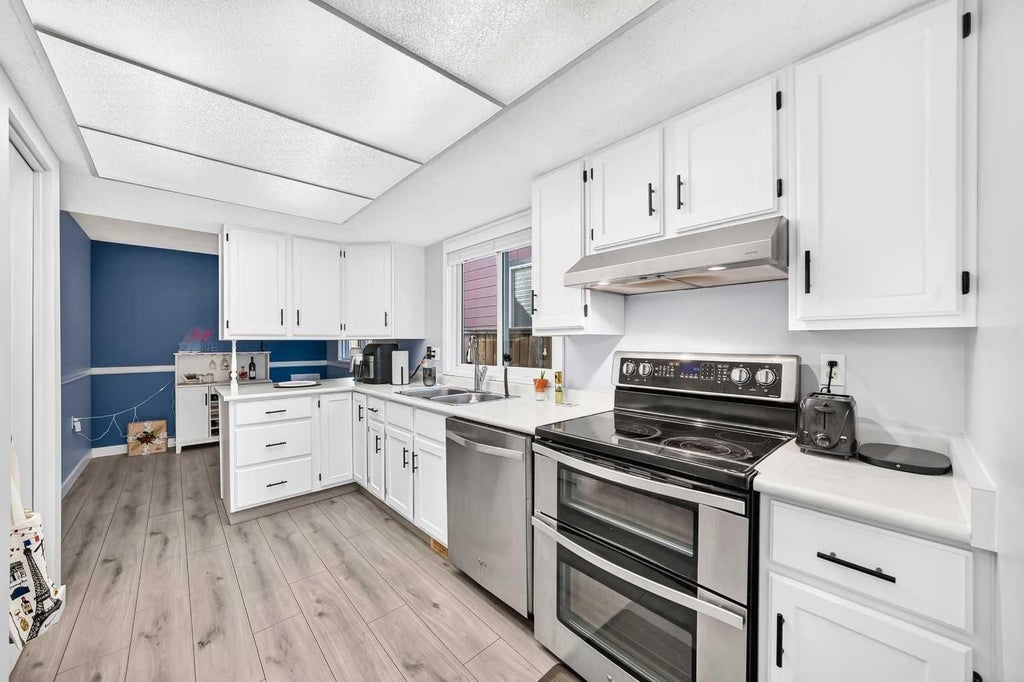 Photo of 52 Cedargrove Road SW, Calgary, AB T2W 4T9 (MLS # A2351421)