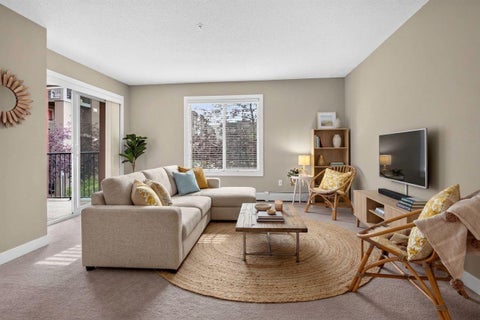 Photo of 403 Mackenzie Way SW #2206, Airdrie, AB T4B 3V7 (MLS # A2347939)