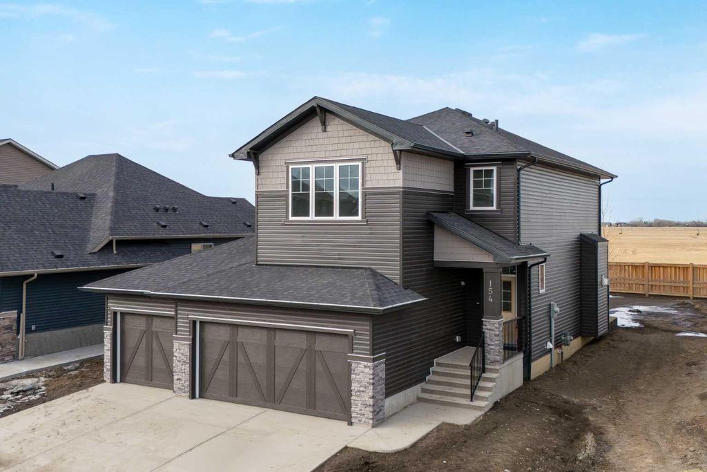 Photo of 154 Northern Lights Crescent, Langdon, AB T0J 1X2 (MLS # A2290853)