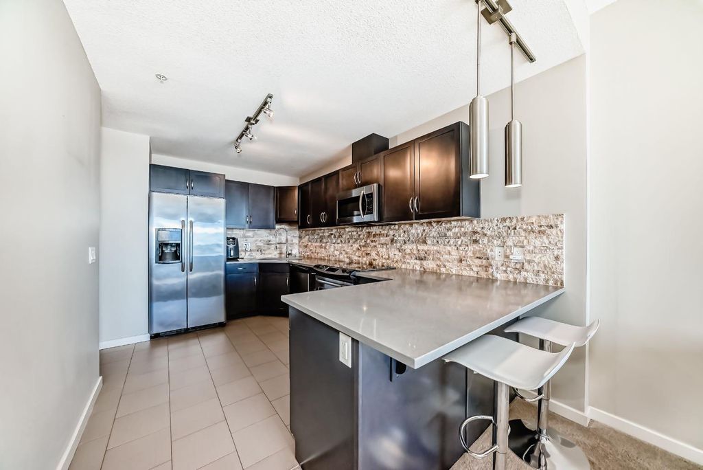 Photo of 1320 1 Street SE #2701, Calgary, AB T2G 0G8 (MLS # A2290764)