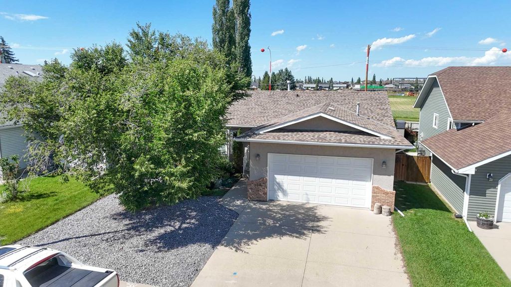 Photo of 254 Maple Grove Crescent, Strathmore, AB T1P 1G2 (MLS # A2328500)