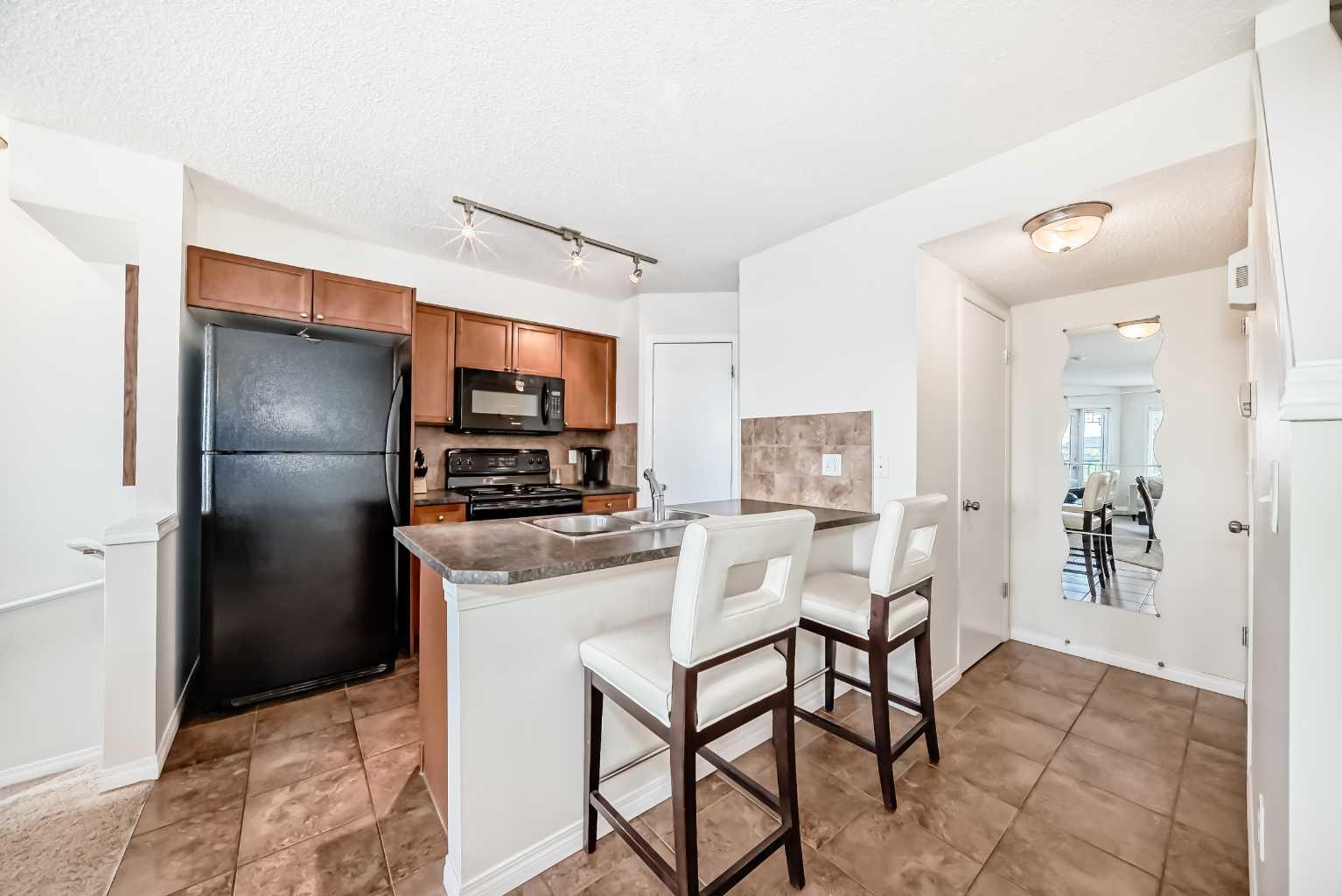 21 McKenzie Towne Gate SE #12