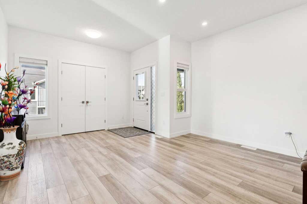 Photo of 51 Midgrove Drive SW, Airdrie, AB T4B 5K7 (MLS # A2318040)