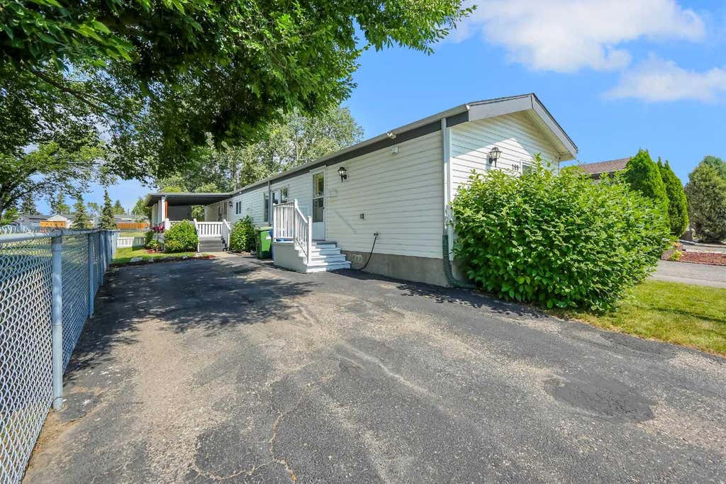 Photo of 169 Erin Woods Circle SE, Calgary, AB T2B 3E1 (MLS # A2334682)